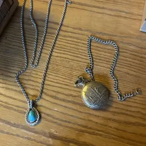 Avon necklace and a pocket watch