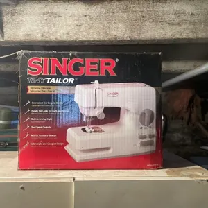 Singer Tiny Tailor sewing machine with handheld