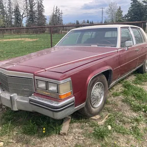 1985 Cadillac Fleetwood Red Sedan s/n: 1G6DW69N1F9736423