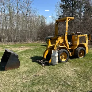 WALDON 4000 WHEEL LOADER 3,054.5 HOURS SHOWING, S/N 14025 W/ (2) PROPANE BOTTLES, AND SMOOTH BUCKET