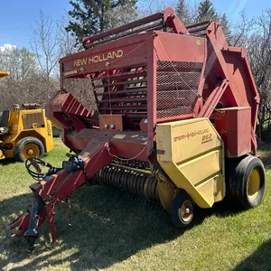 SPERRY – NEW HOLLAND 852 ROUND BALER, AUTO-WRAP SYSTEM, CHAIN DRIVE ROLLER, 540 PTO S/N 595615