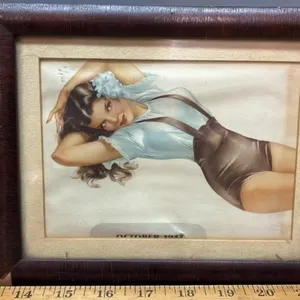 Framed October 1947 Pinup Girl. 9�x7.5�.