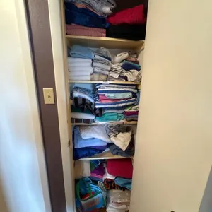 LOT OF LINENS IN CLOSET