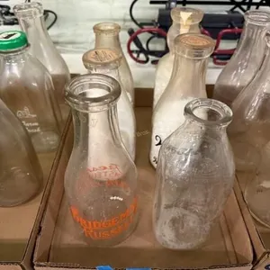 Flat of misc. milk bottles