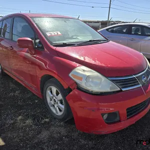 SALVAGE UNIT: 2009 Nissan Versa Car - Red
 UNRESERVED