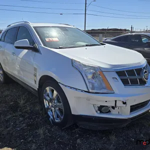 SALVAGE UNIT: 2010 Cadillac SRX  SUV - White
 UNRESERVED