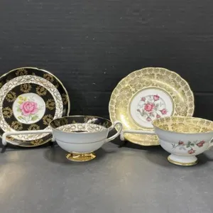 2 Interior Decorated Teacups & Saucers
