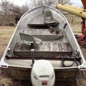 12' aluminum boat, trailer, and 9 hp Johnson motor