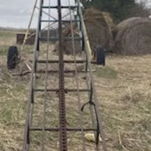 Approximately 24 ft bale elevator.