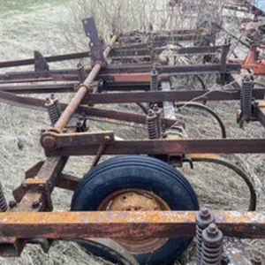 IHC Deep Tiller with Mounted Harrows.