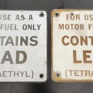 2 Vintage "Contains Lead" Gasoline Pump Signs