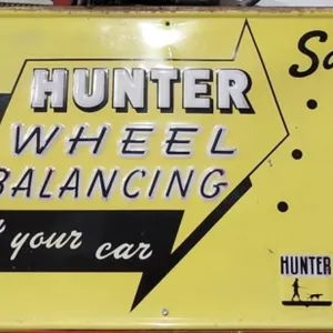 Hunter Wheel Balancing Metal Sign, 38.5"W x 27"T