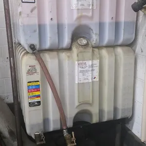 2 Poly Oil Containers on Stand