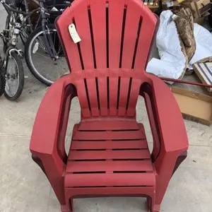 Three Adirondack outdoor chairs.