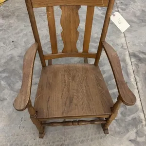 Wooden rocking chair.