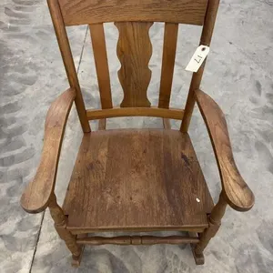 Wooden rocking chair.
