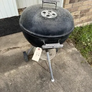 Outdoor charcoal grill.