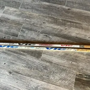 Wooden Hockey Sticks with unknown signatures