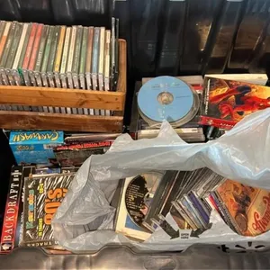 Bin of CDs, DVDs, and VHS