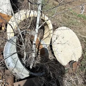 CEMENT MANHOLE EXTENSION + LID, STEEL TRACTOR RIM