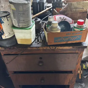 Wood 5 drawer cabinet with miscellaneous items