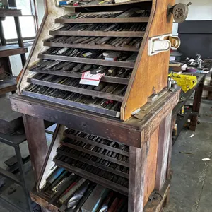 Rack with hundreds of tapered drill, bits and reamers and taps