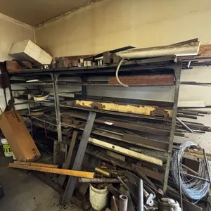All the steel stockpile on the racks and the floor including the rack