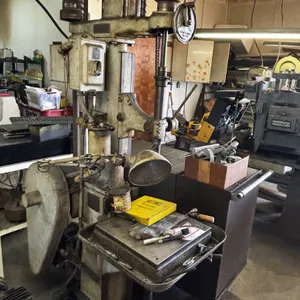 Wolverine large floor model drill press, : The machine shown is belt-driven and likely powered by a