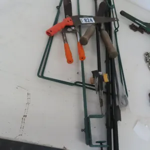 Lot - Pruning Shears, Pruning Saw, Garden Sprinkler, Garbage Bag Holder.