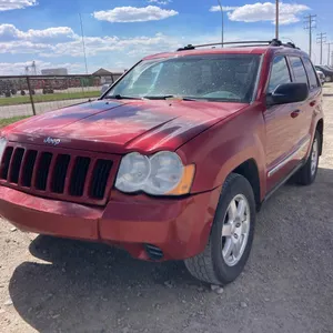 2010 Jeep Grand Cherokee Red SUV s/n: 1J4PR4GK1AC133105