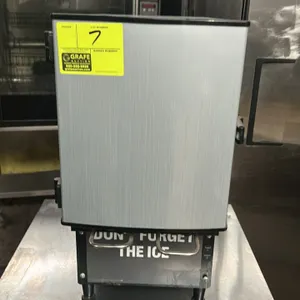 2022 KanPak CDE 212 refrigerated coffee creamer dispenser. Features dual dispensing handles and a stainless steel front door. Refrigerant: R600a. Elec