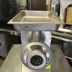 Biro commercial meat grinder. Features a top-mounted stainless steel feed pan. Powered by a 1 HP motor. Electrical: 115V, 60 Hz, 1-Phase. S/N: C 974. 