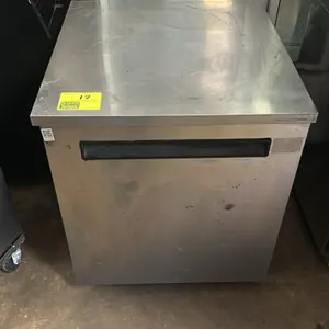 Manitowoc 406-STAR2 stainless steel self-contained undercounter refrigerator. Features a single solid door, one interior wire shelf, and a temperature