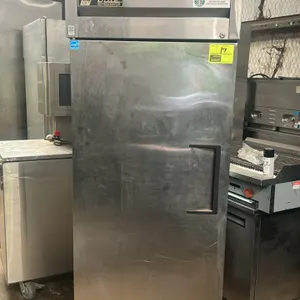 True TG1R-1S 1-door reach-in refrigerator. Features stainless steel construction, 3 interior wire shelves, and a self-contained refrigeration system. 