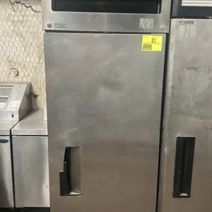Delfield 6000XL Series single-door reach-in refrigerator. Features a stainless steel exterior, plastic interior liner, and three wire shelves. Self-co