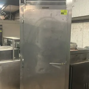 Traulsen ARI132HUT-FHS stainless steel roll-in refrigerator. Features a self-contained refrigeration system, single solid door, interior roll-in track