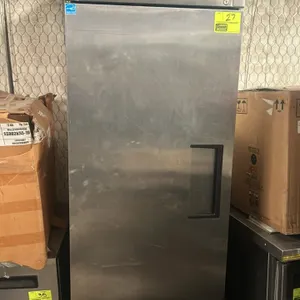 True T-23F single-section reach-in freezer. Features stainless steel exterior, white aluminum interior, and three adjustable wire shelves. Self-contai