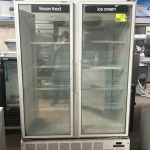 Master-Bilt BLG-48HD 2-door glass door merchandiser freezer. Features self-contained refrigeration, illuminated sign panels, and wire shelving. 51"W x