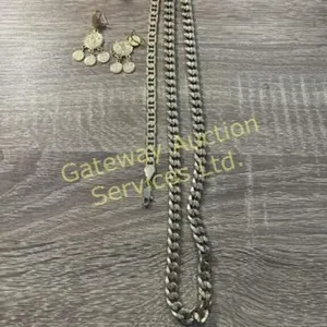 20 inch gold colored necklace stamped 18 K
