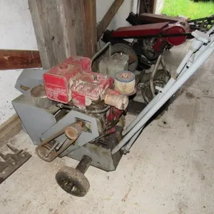 Concrete scarifier/planer