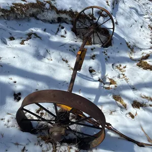 2 Steel wheels. 25" across