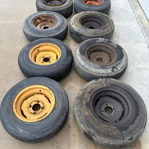 8 Tires & rims, all 9.5-15 SL, various conditions
