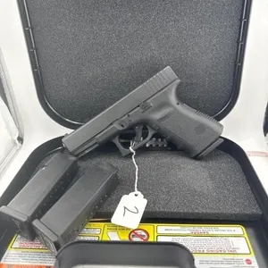 Glock 32 357 
Case, two 13 round clips, and one