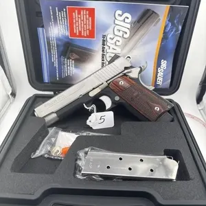 SIG 1911 C3 45 cal
Three clips and case included