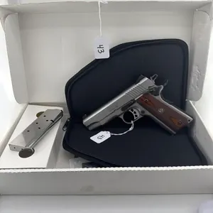 Ruger 1911 45 cal 
Box, soft case, and two clips