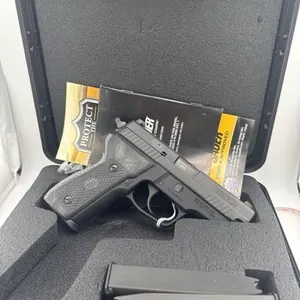 SIG P229 Elite 9MM
Case and three 14 round clips