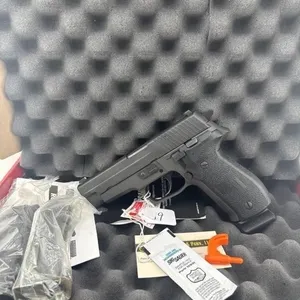 Sig P226 357 
Box, one 13 round clip and two 12