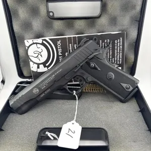 Taurus PT 1911 45 ACP
Case, and two 8 round