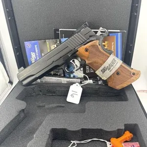 Sig 1911 45 
One 8 round clip and case included