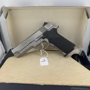 Smith & Wesson 1076 10MM
One 9 round clip and